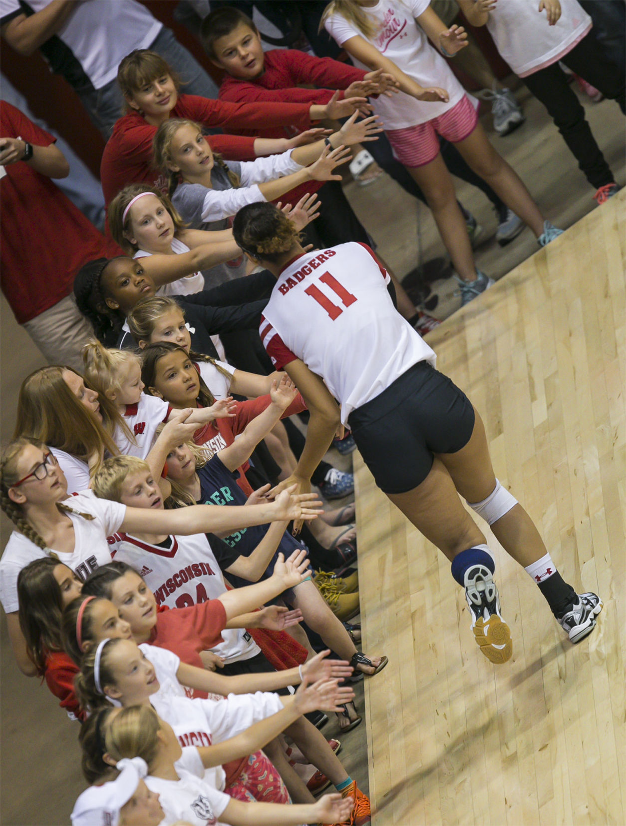 Tionna Williams greets fans, Badgers volleyball